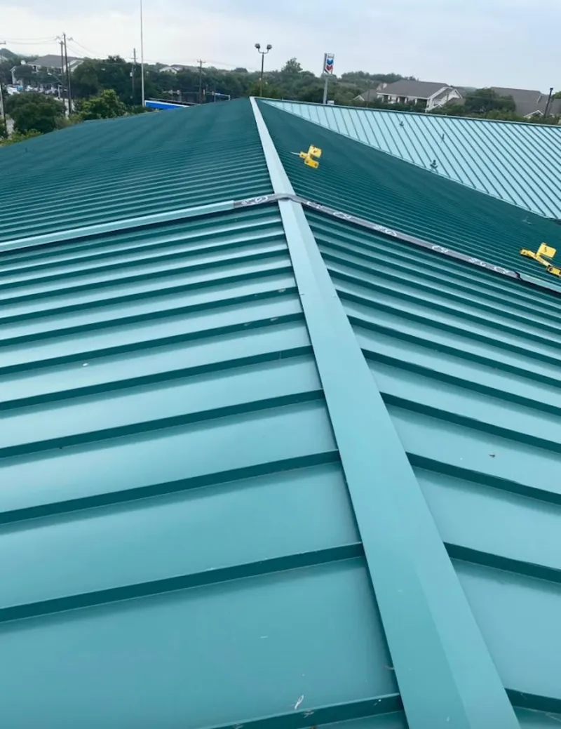 Green commercial metal roof ridge and valley for Metal Roof Repair in Melvindale