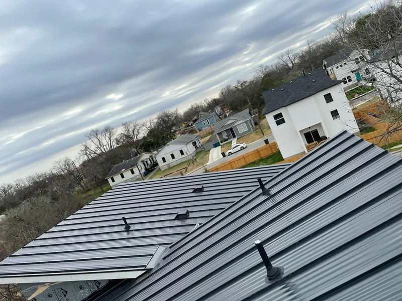 Standing seam metal roof panels with vents for Skylight Repair in Melvindale